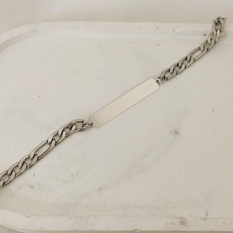 PULSEIRA 3X1 COM PLAQUINHA DE 3,4MM. 23CM DE COMPRIMENTO. EM AÇO INOX.