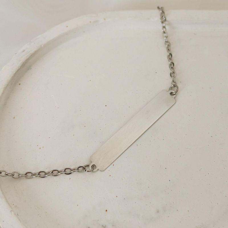 PULSEIRA ELO CADEADO COM PLAQUINHA DE 3,4MM. 20CM DE COMPRIMENTO E 5CM DE REGULAGEM. EM AÇO INOX.